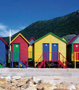 Quirky beach huts adding a splash of color to Cape Town’s lovely Muizenberg Beach, South Africa