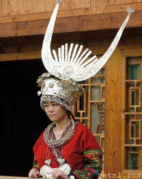 Elaborate traditional dress worn by Miao villagers, Guizhou province